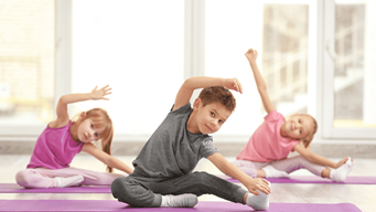 3 Children in a yoga mat each participating in gymnastics.